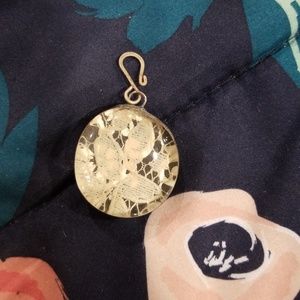 Double sided round pendant